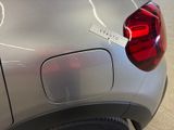 a close up of a car with a sticker on it