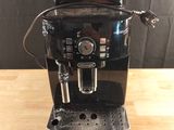 an image of a coffee machine on a wooden table