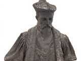 statue of a man with a beard and a hat on a white background