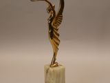statue of an angel on a marble base