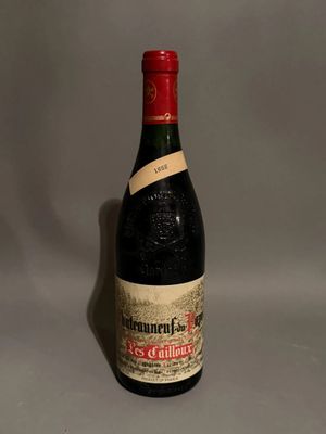 a bottle of wine that is sitting on a table