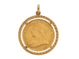 une pièce d'or sur laquelle figure, au centre, la tête d'une femme