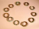 a circle of rings made out of metal on a table
