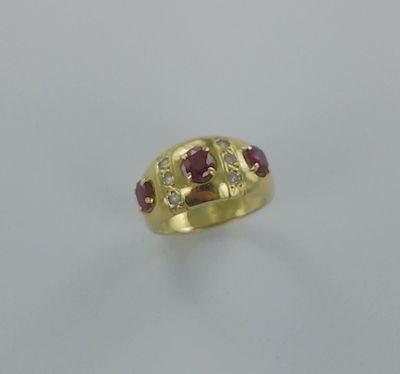 Bague en or sertie de pierres précieuses - TDD 52, 7g