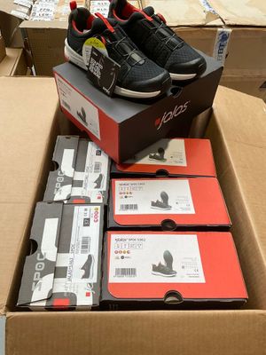 a box with a pair of shoes on top of it