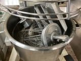 an image of a mixer in a kitchen with a wire basket