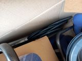 a box full of assorted items sitting on the floor