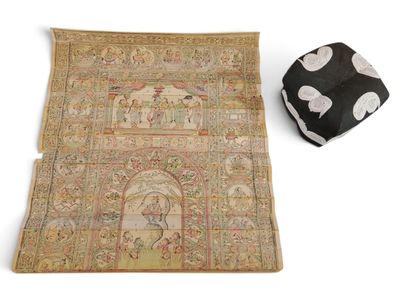 a rug and a pillow on the floor next to each other