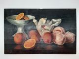 un tableau représentant des oranges et un bol d'oranges posé sur une table