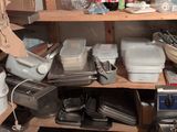 many containers and containers on the shelves in the kitchen