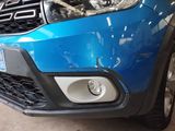 a close up of the front of a blue car