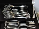 silverware in a black case with silverware in it
