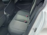 a white car with black seats in the back of it