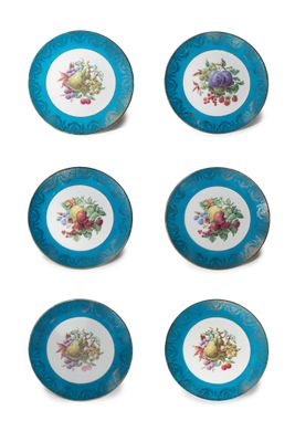 six blue and white plates with flowers and fruit on them
