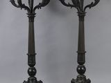 pair of antique bronze candelabs on marble bases