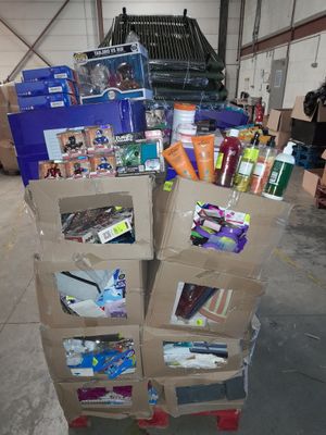 a cart with many boxes on it in a warehouse