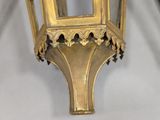 pair of antique brass lanterns on a white background
