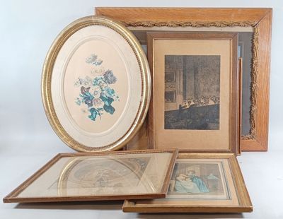 three framed pictures and a picture of a woman in a blue dress