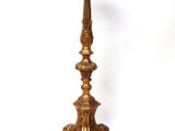 brass candle holder on a white background with a white background