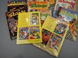 a lot of comic books that are on the table