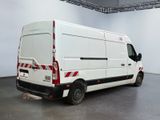 a white van that is parked in a large room