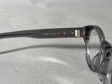 a pair of glasses that are on a table