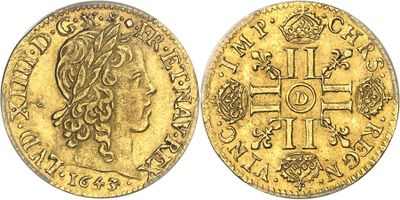 l'image d'une pièce d'or portant une croix