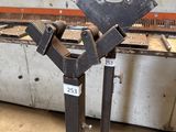 a picture of a pair of metal clamps on a stand