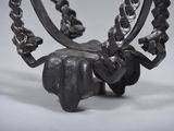 an image of a metal sculpture of a horse ' s head