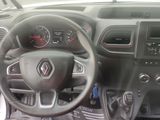 the interior of a car with a steering wheel and dashboard controls