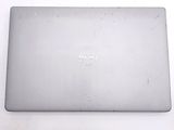 dell laptop computer sitting on a white surface with a logo on the screen