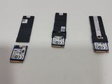 three different types of usb drives are shown on a white surface