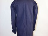 an image of a blue coat on a mannequin stand