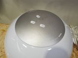 a white and silver electronic device on a table