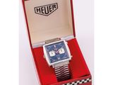 an image of a watch in a red box on a white surface