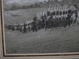 a picture of a group of soldiers marching in a line