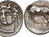 a close up of a coin with a horse on it