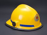 a yellow hard hat with a blue stripe on it