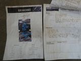 two pages of paper with a picture of a machine on them