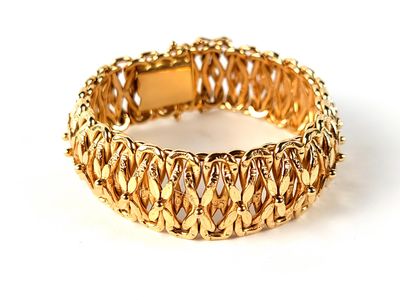 gold plated bracelet on a white background with a white background