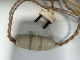 two plugs that are connected to a rope