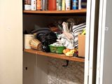 a pantry with a lot of items on the shelves