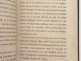 an open book with a picture of a cat on it