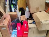 many boxes stacked on a pallet in a warehouse