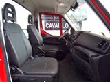 the interior of a red truck with black seats and a sign that says caval lo