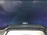 a close up view of a laptop screen with a sky background