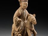 une image représentant la statue d'un homme avec un chien