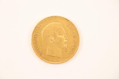 an image of a close up of a gold coin on a white surface