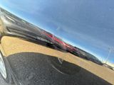 a reflection of a car in the side mirror of a car