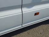 a close up of a car door with a sticker on it